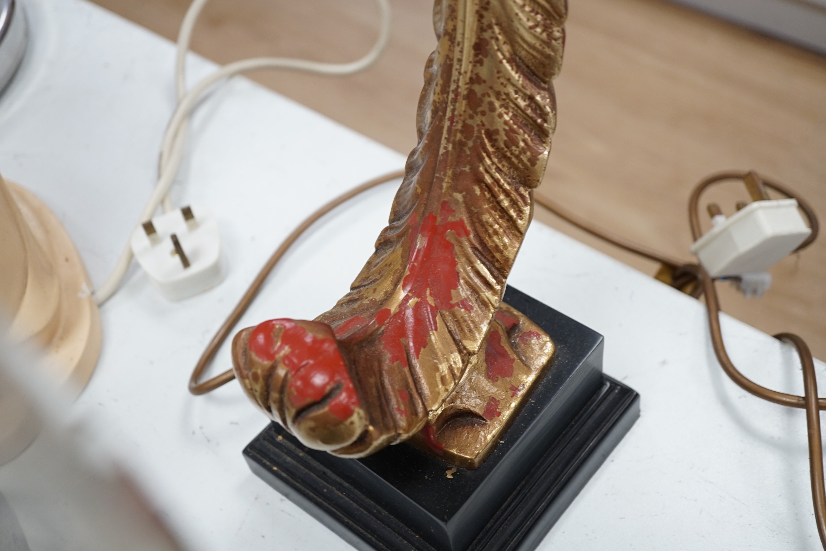 A pair of gilt resin scrolling feather table lamps. 74cm high